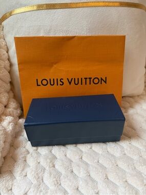 Louis Vuitton Navy Eyewear Case with shopping bag.